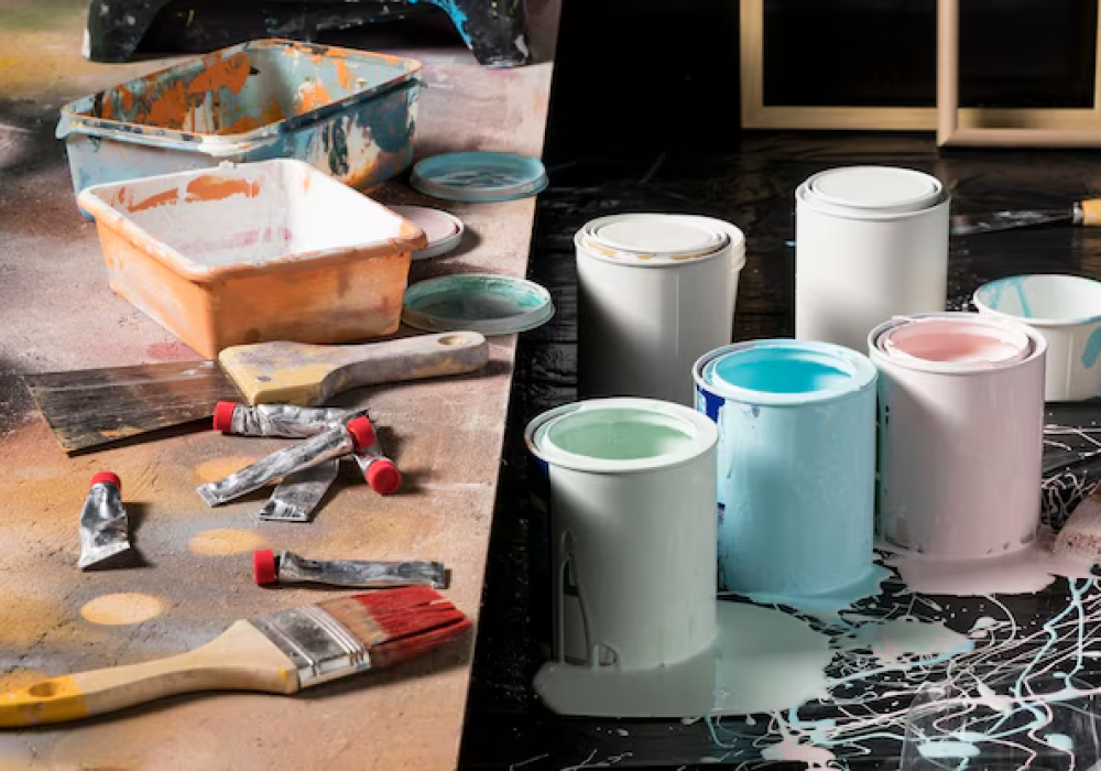 high-angle-colored-paint-cans-studio_23-2148591280